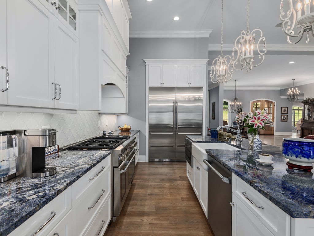 Granite countertops, undermount prep sink and high-end stainless appliances
